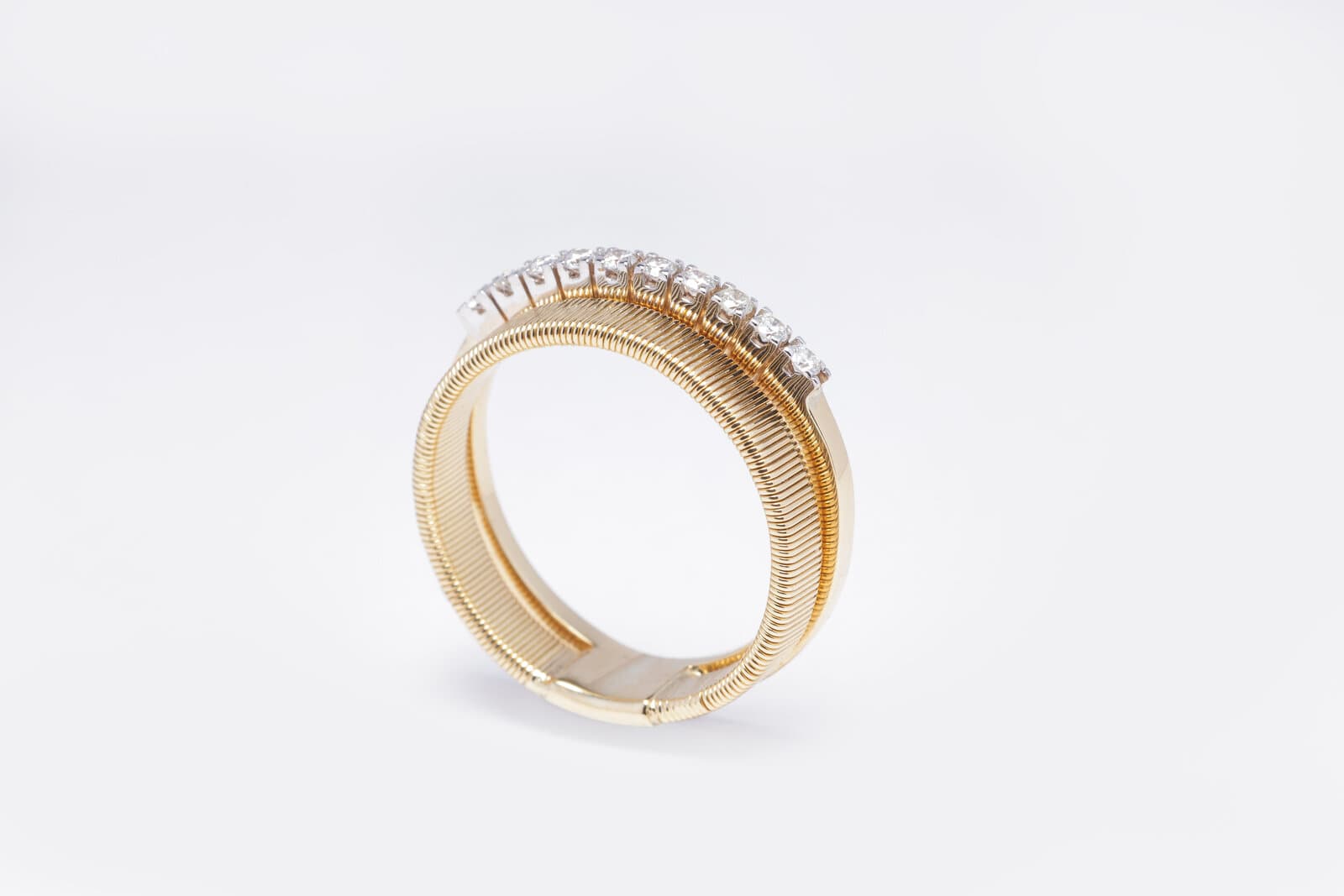 Handcrafted two band ring with diamonds