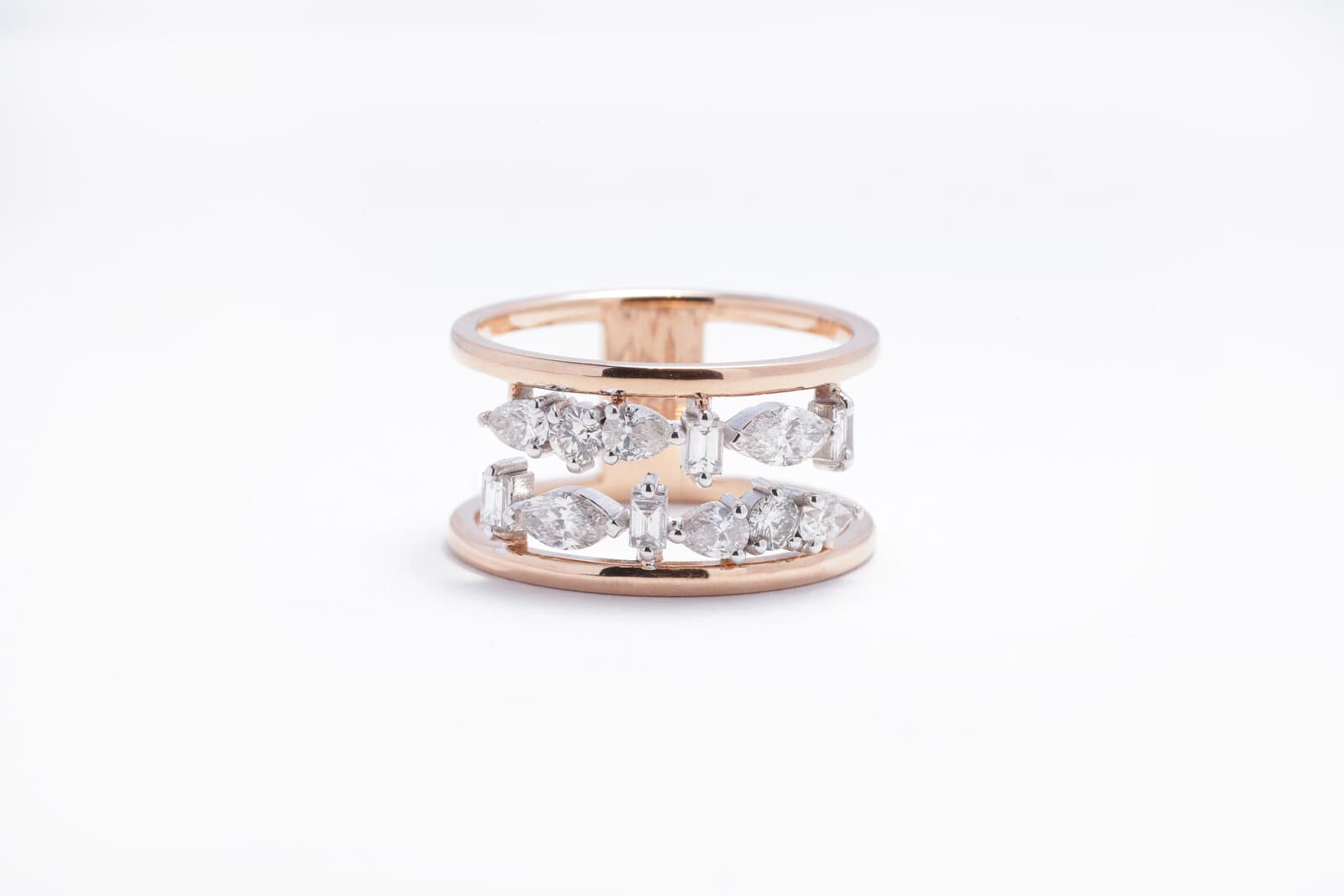 Two interlinked bands adorned with diamonds in various shapes